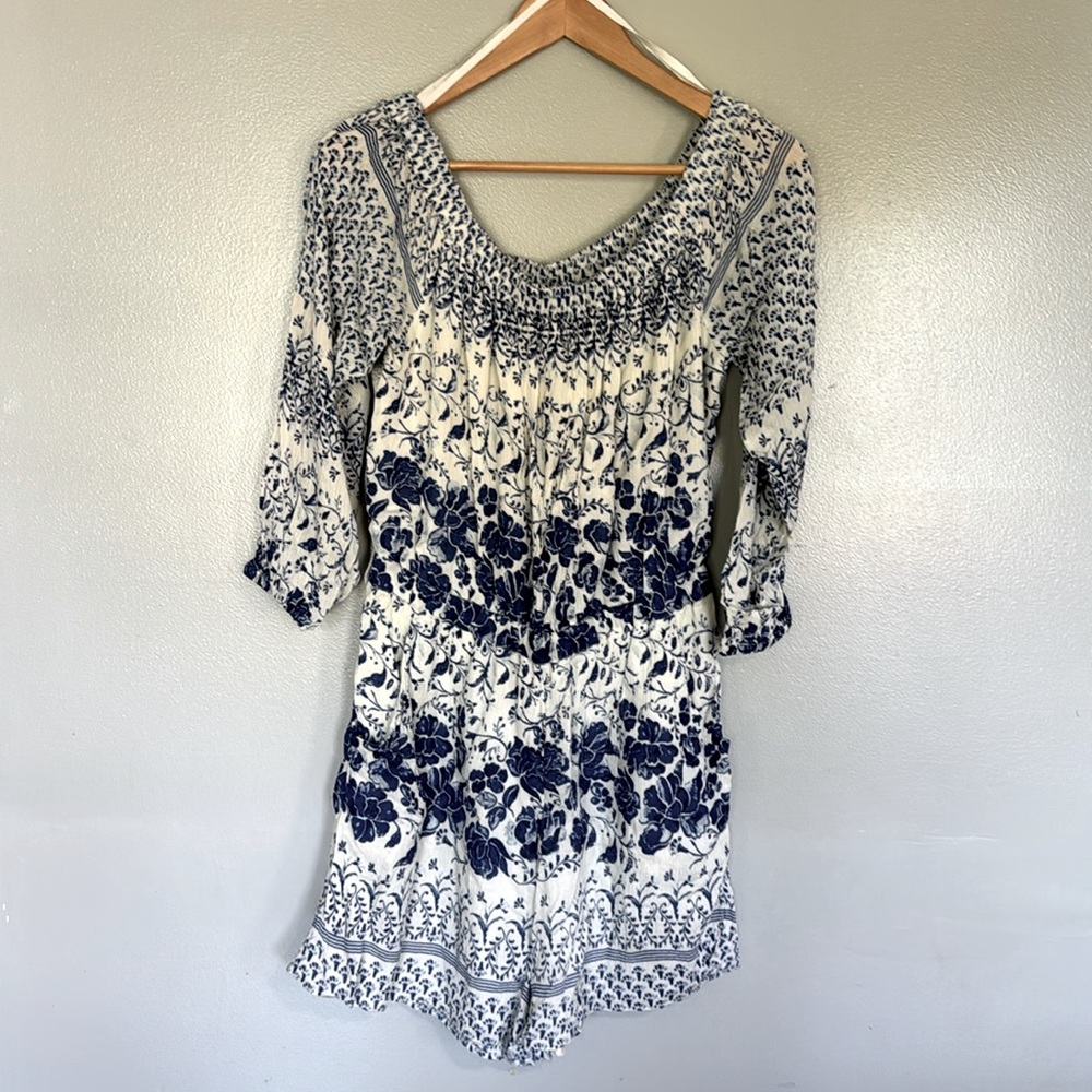 Anthropology, blue, and white romper with pockets